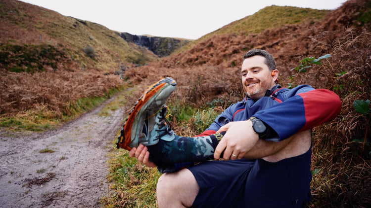 Wet trail running shoes with waterproof socks after trail running in cold weather with waterproof socks for men